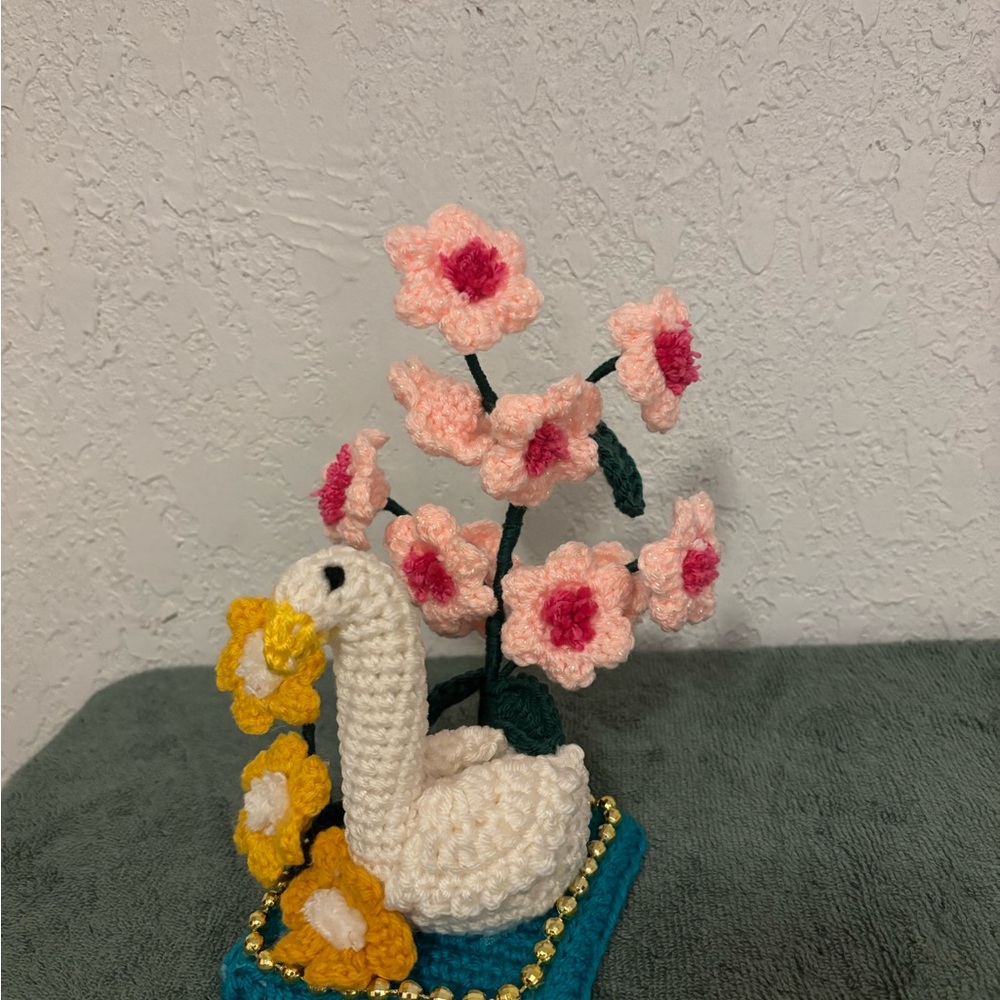 Handcrafted Crochet Swan with Floral Accents